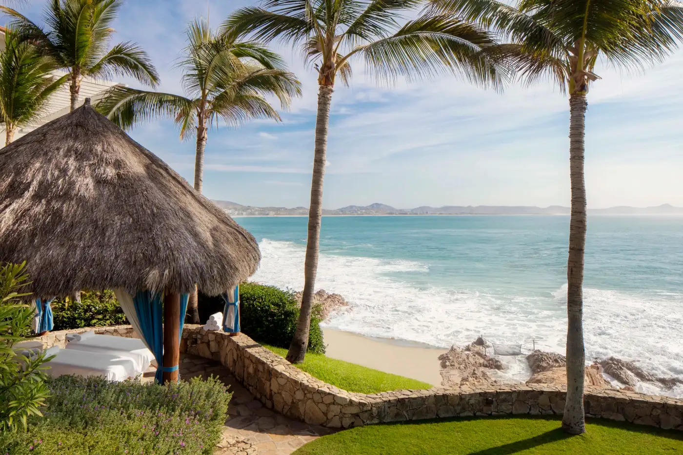 One and Only Palmilla resort on the Sea of Cortez with palapas and beachfront views